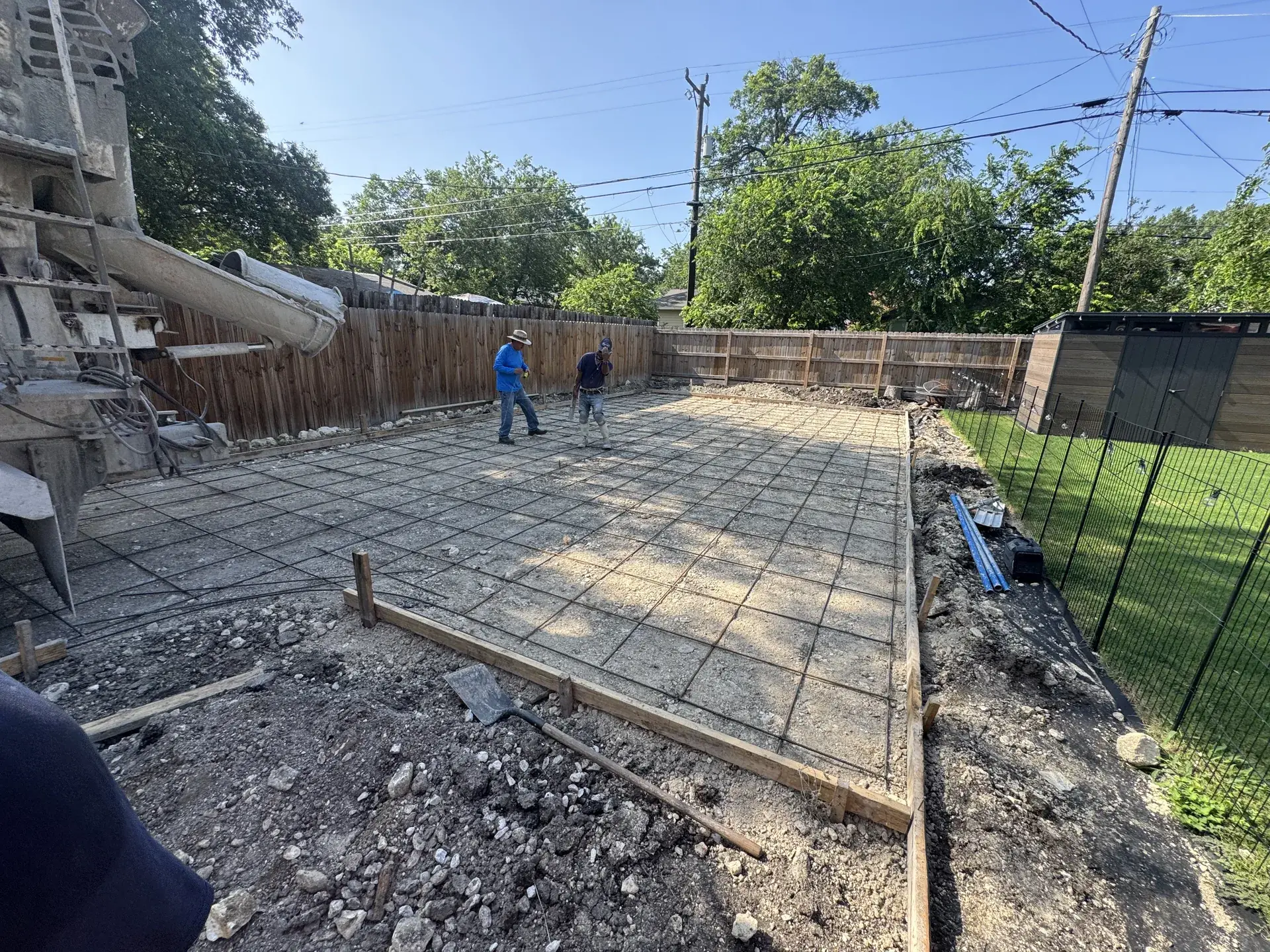 Five Star Trucking crew setting rebar for a concrete slab in San Antonio