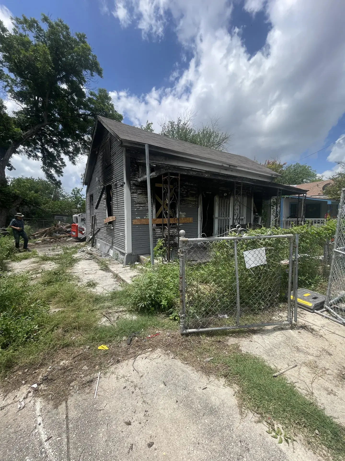 Fire-damaged house in San Antonio before demolition