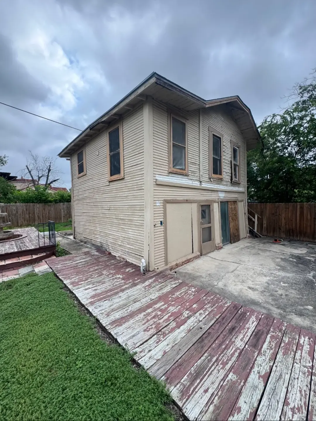 Before: two-story house in San Antonio demolished and the lot cleared